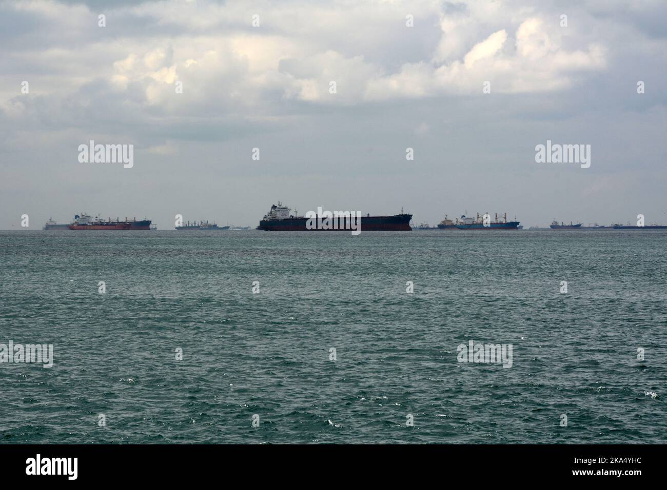 Bulk carrier merchant grain ships bound for Ukraine and Russia await entry in the Sea of Marmara at the south end of the Strait of Bosphorus, Turkey. Stock Photo
