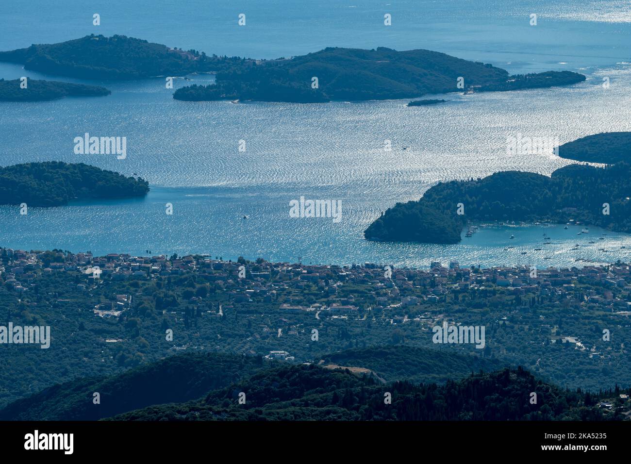 Aerial view of a seaside town with nearby islands. Stock Photo
