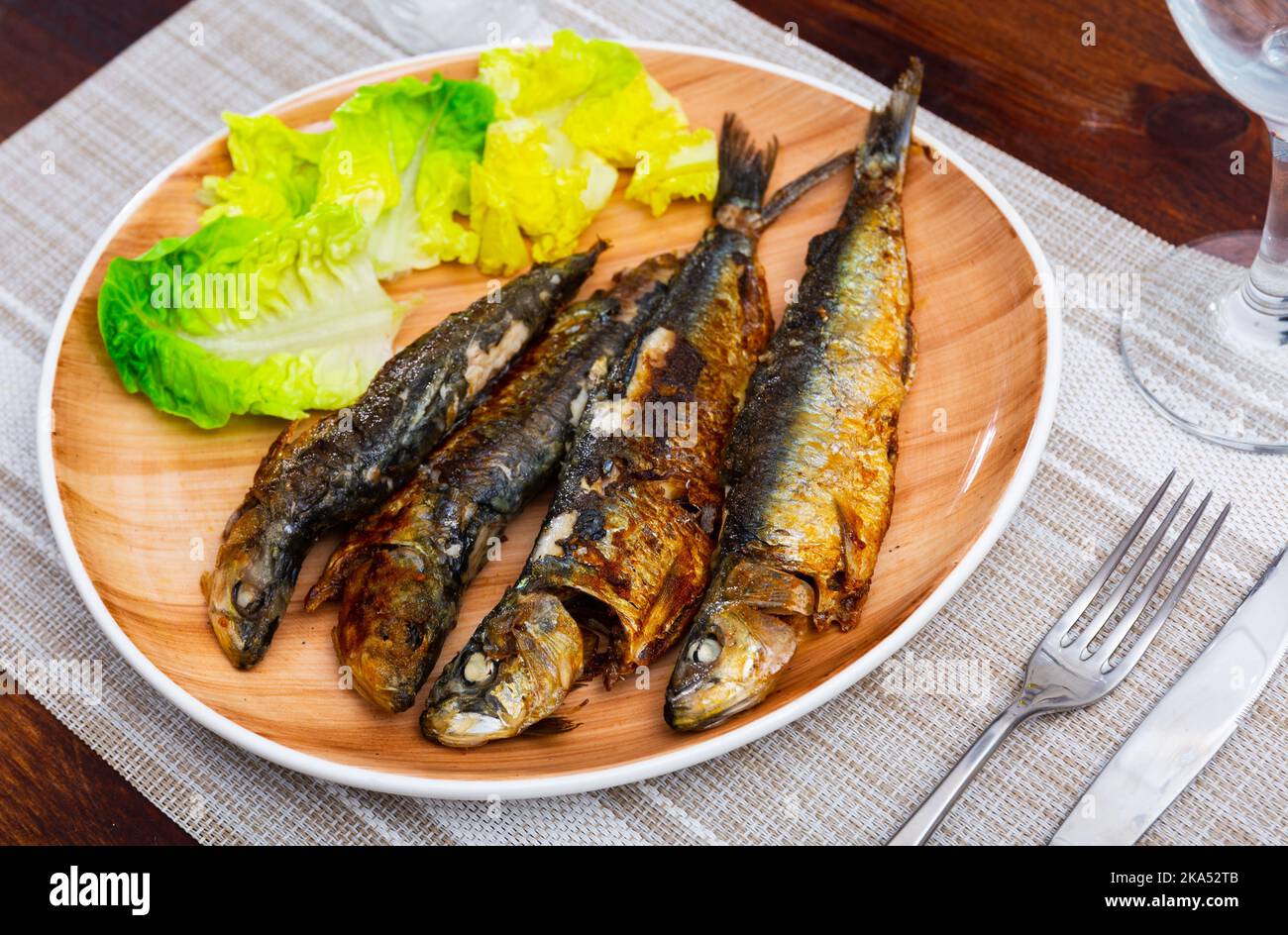 Grilled sardines served with fresh vegetable salad Stock Photo Alamy