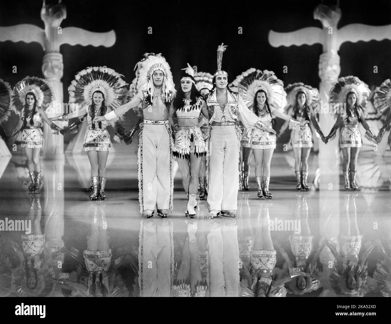 Roy Shipstad (left), Eddie Shipstad (right) with Ice Follies, on-set of the Film, 'The Ice Follies of 1939', MGM, 1939 Stock Photo