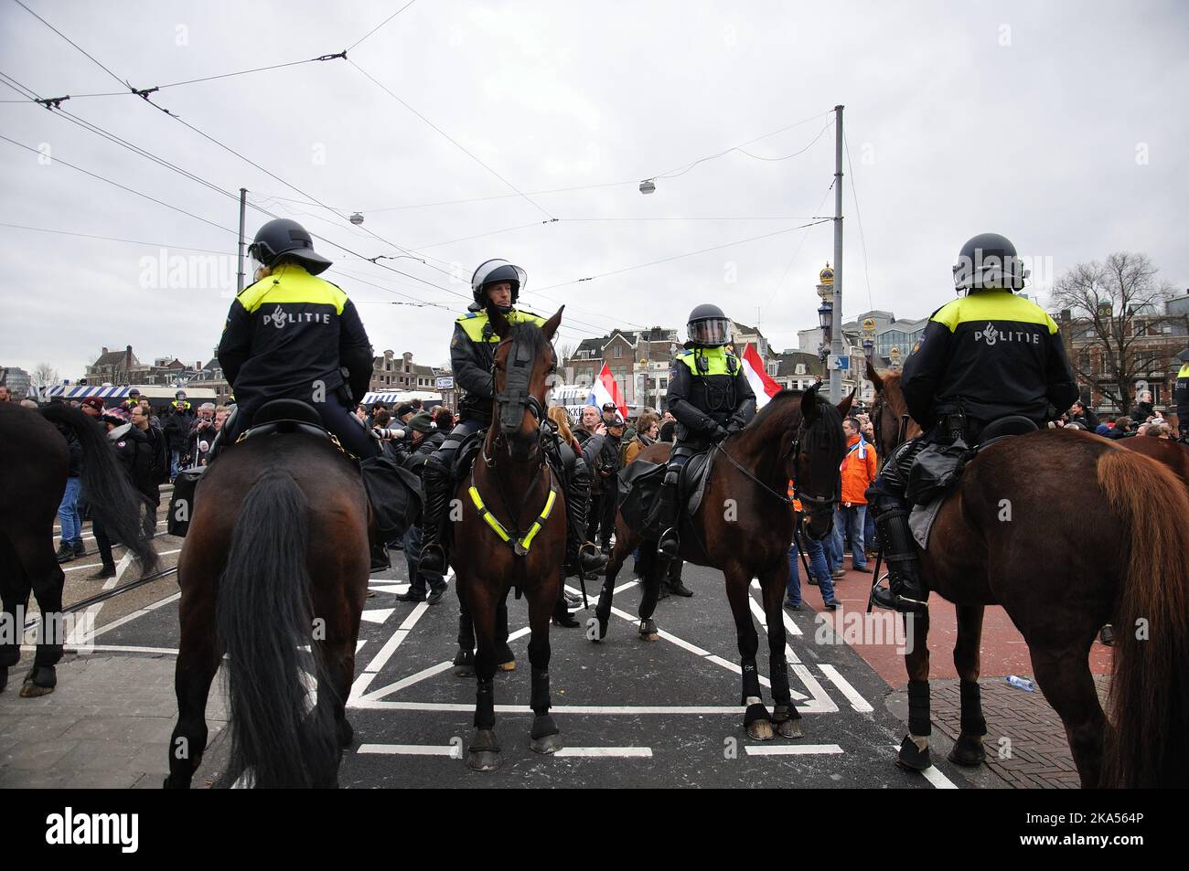 02-06-2016.Amsterdam,The Netherlands.Anti islam movement 'Pegida' protesting. Left wing counter-protesters tried to disrupt,but were stopped by riot police.Over 20 arrests were made. Stock Photo