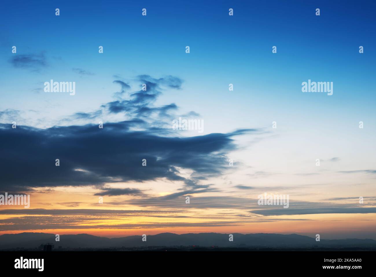 Sunset / sunrise with clouds, light rays and other atmospheric effect ...