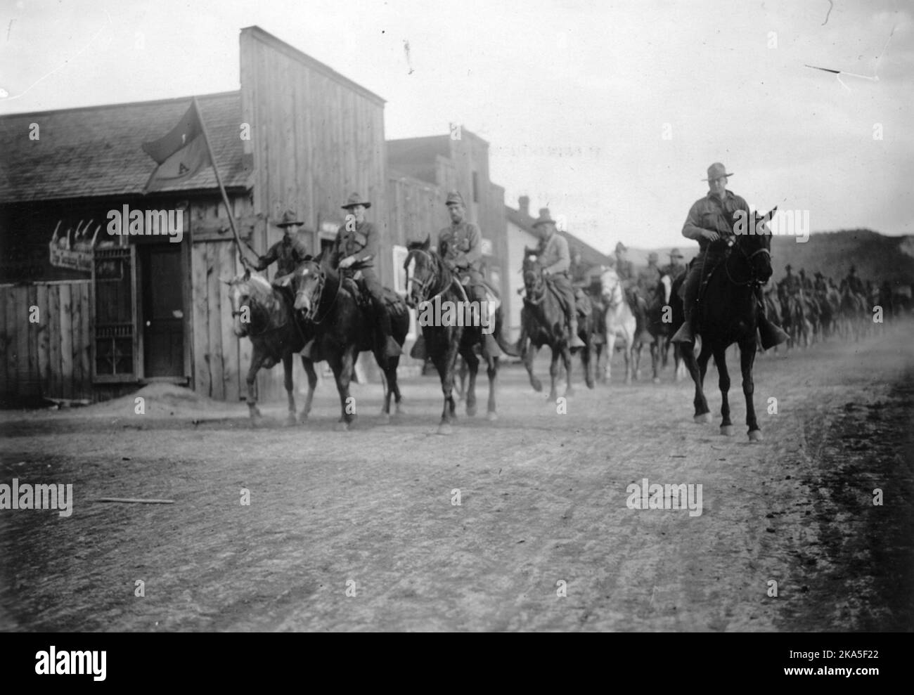 Lt. Karl Linderfelt and the Colorado state militia, ride in on horseback to suppress the strike. Stock Photo