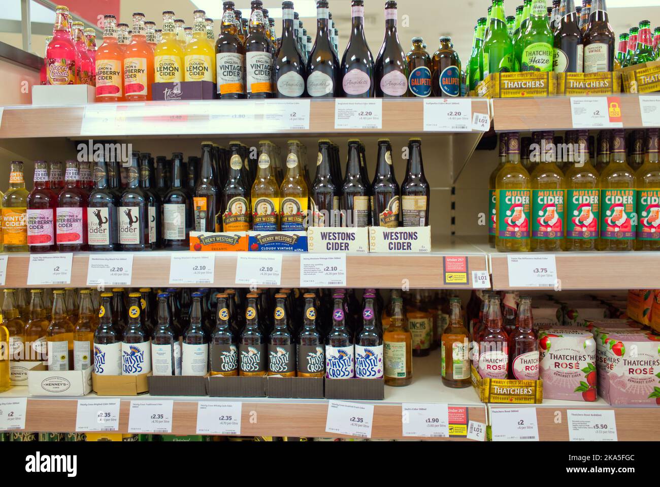 bottles weston cider supermarket stacked Glasgow, Scotland, UK Stock