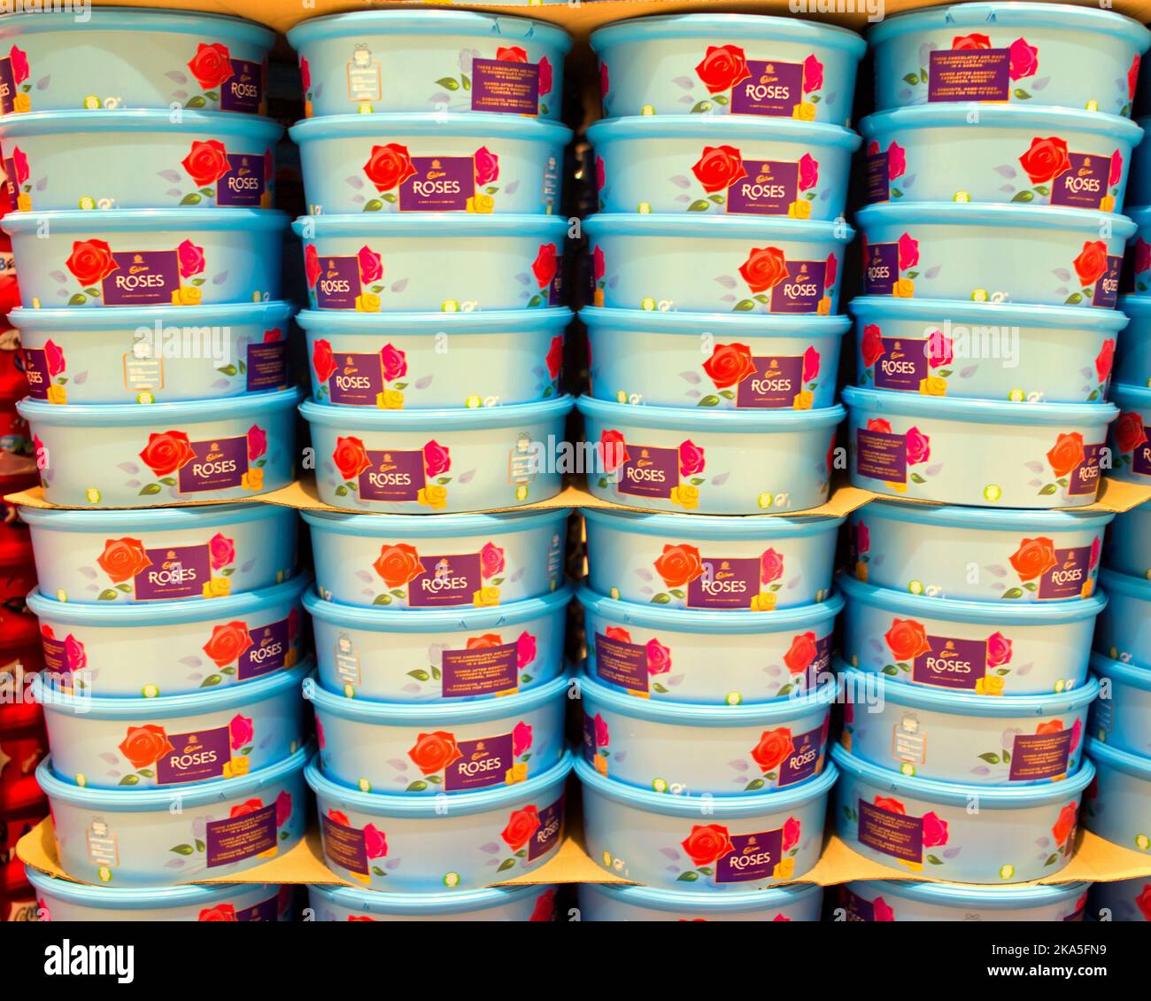 Cadbury's roses  tins in supermarket piles Stock Photo