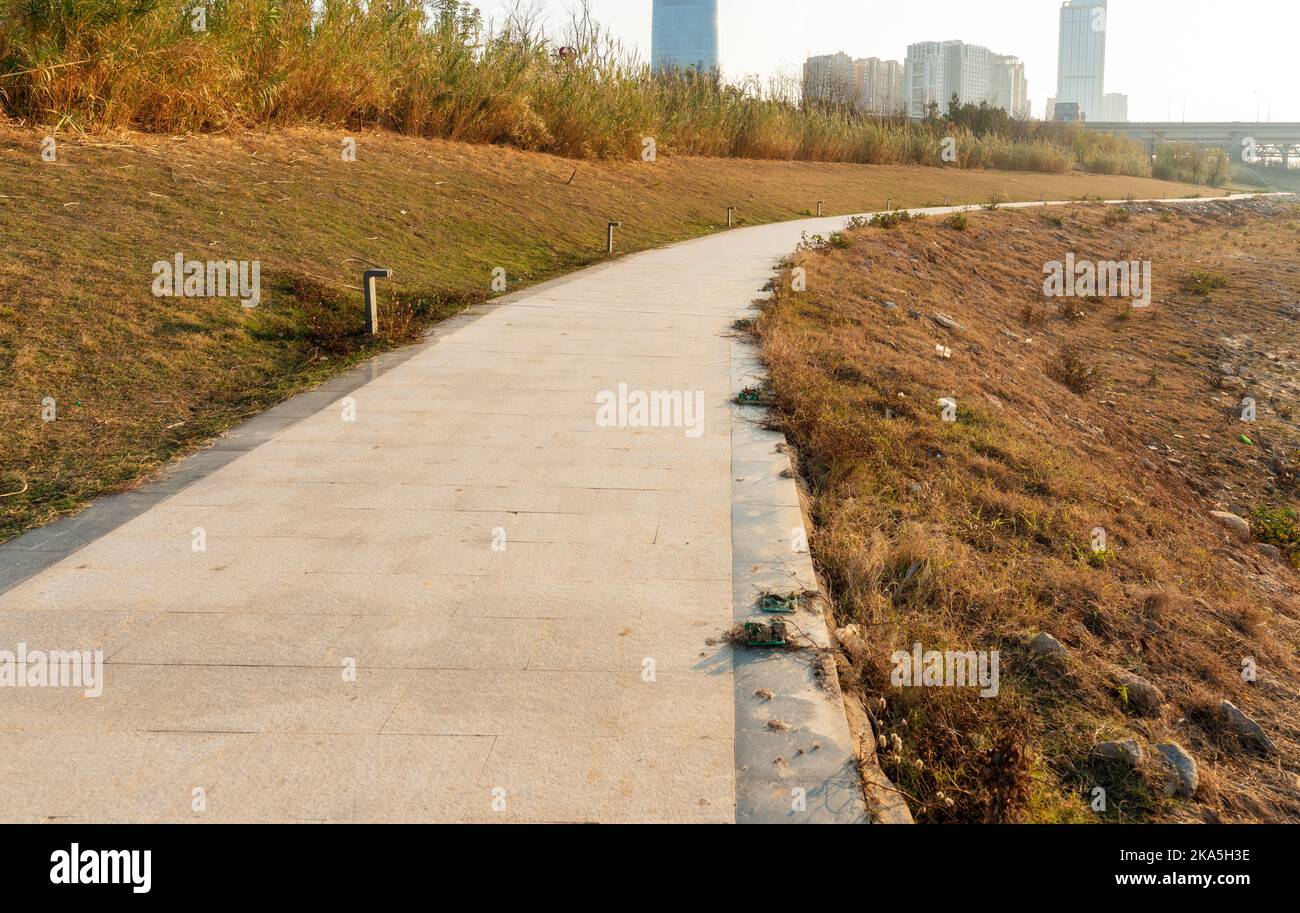 Summer landscape with green grass, road and clouds Stock Photo - Alamy