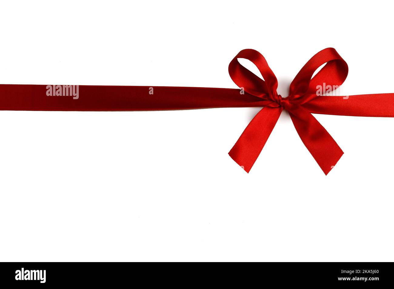 Elegant satin red ribbon bow isolated on white background Stock Photo ...