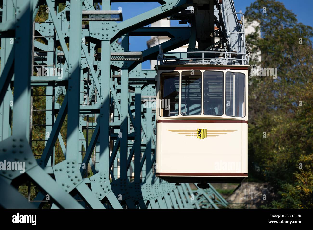 Dresden, Germany. 27th Oct, 2022. A car of the suspension railroad, which opened in 1891, travels to the bottom station. Due to the routine fall overhaul, the aerial tramway will be out of service from November 01 to November 11, 2022. Credit: Sebastian Kahnert/dpa/Alamy Live News Stock Photo