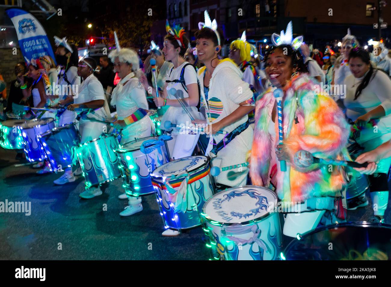 New York, NY, USA. 31st Oct, 2022. The annual Greenwich Village Halloween Parade drew crowds of costumed participants along with bands, dance troupes, stilt walkers, commercial floats, and giant puppets. The all-women drumline Fogo Aziul. Credit: Ed Lefkowicz/Alamy Live News Stock Photo