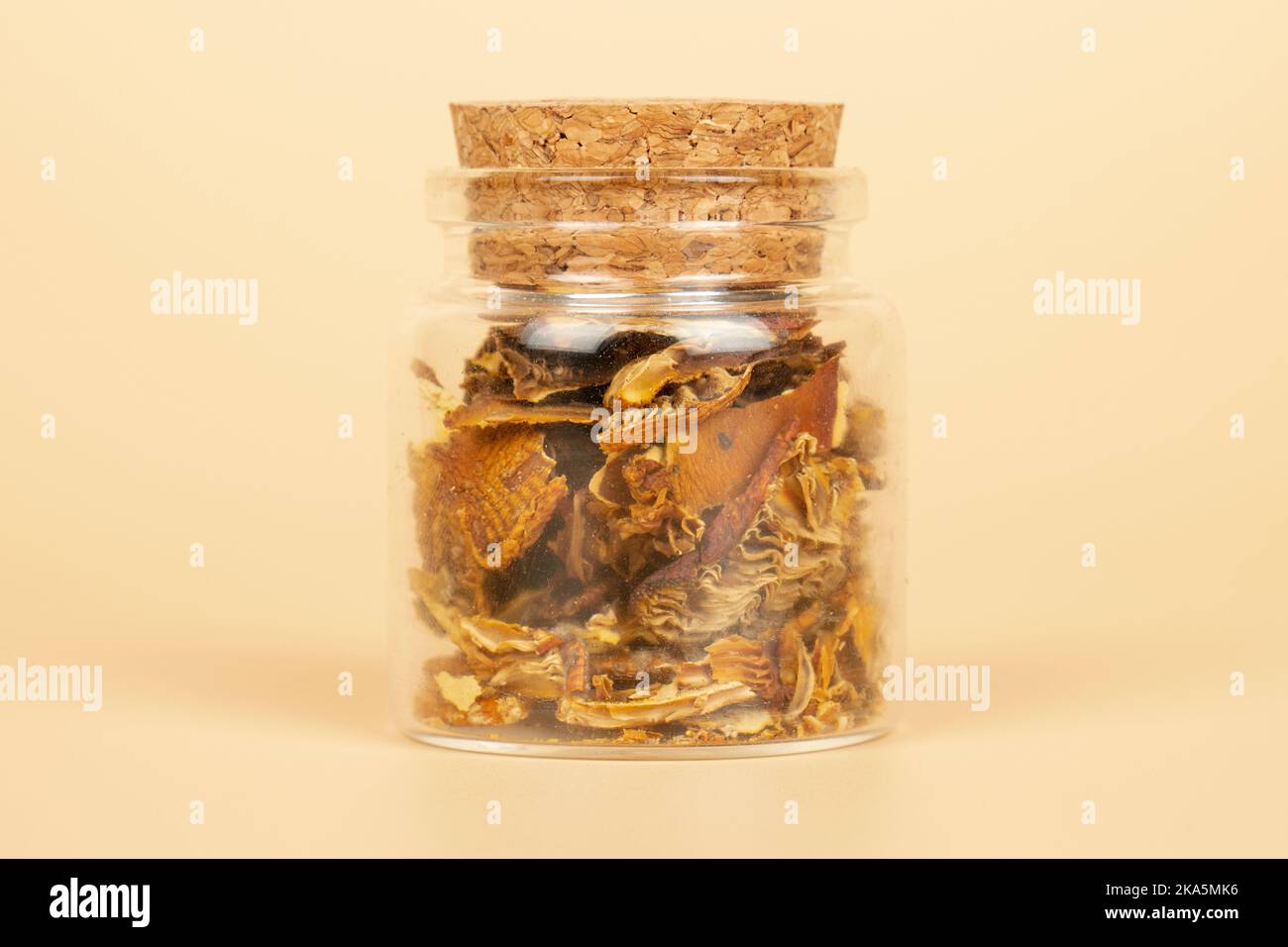 dried fly agaric in a jar for the microdosing use closeup, hack mind mushrooms. Stock Photo