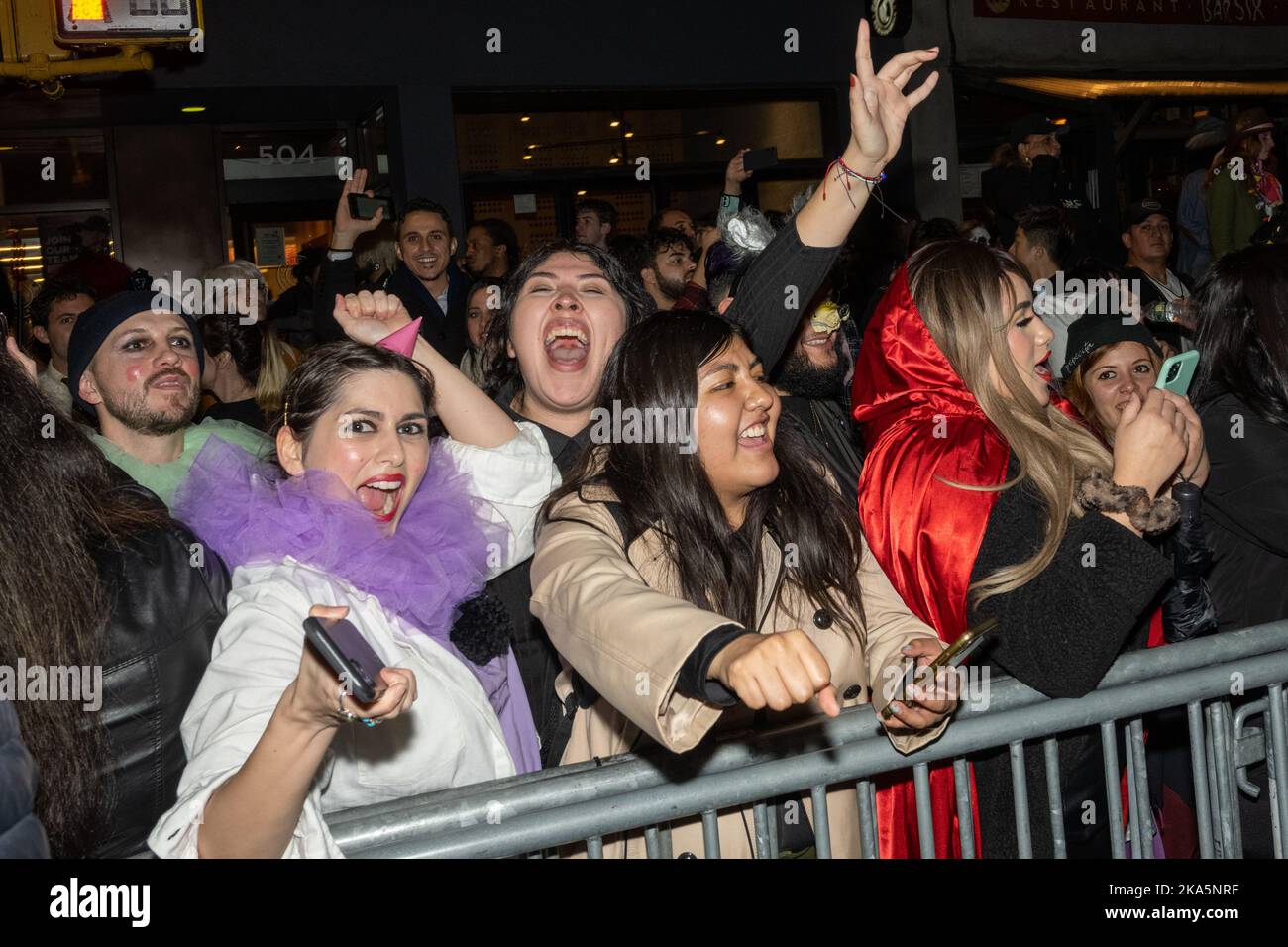 New York, USA. 31st Oct, 2022. Spectators wear costumes as they attend the 49th annual Halloween 