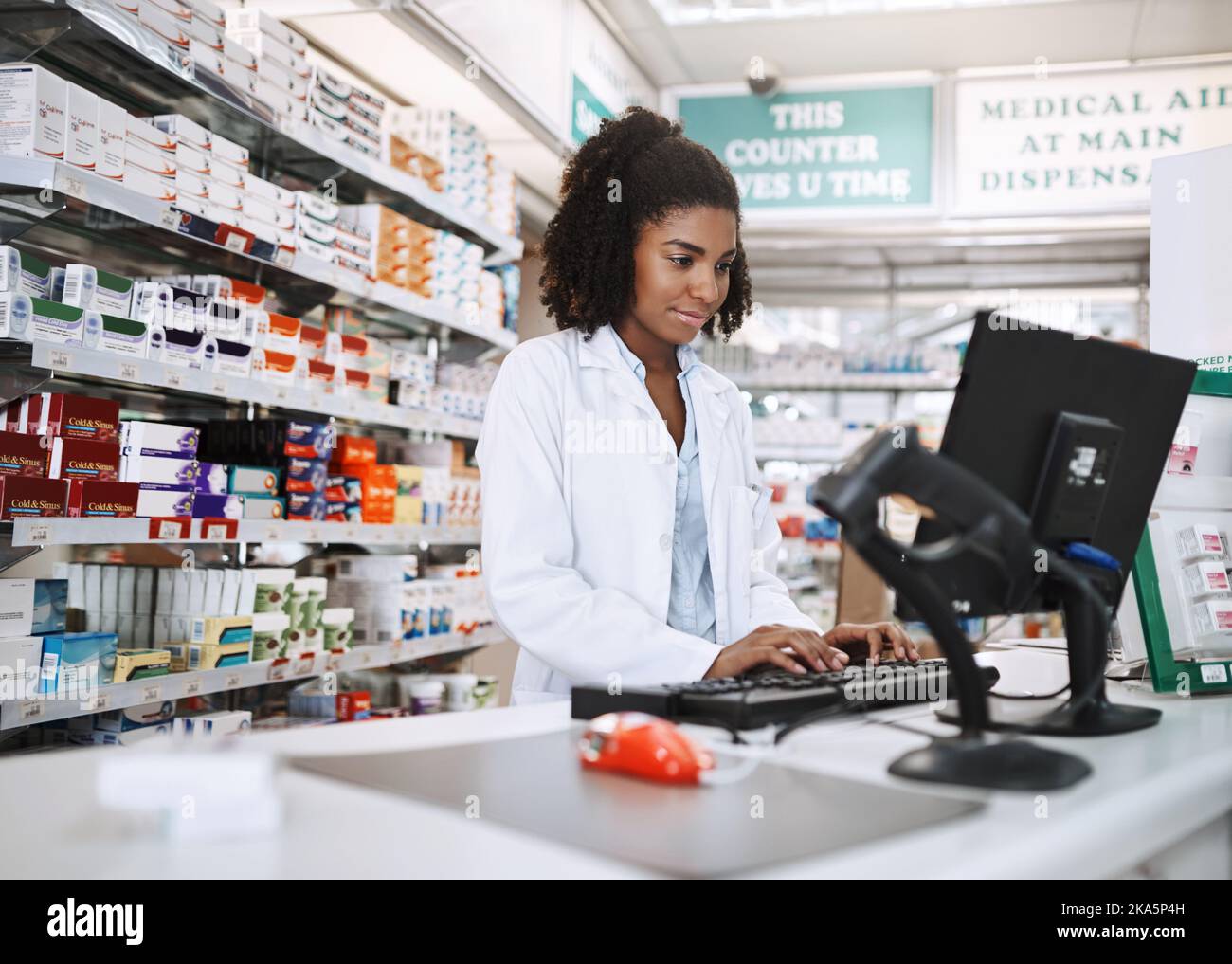 Young pharmacy staff hi-res stock photography and images - Alamy
