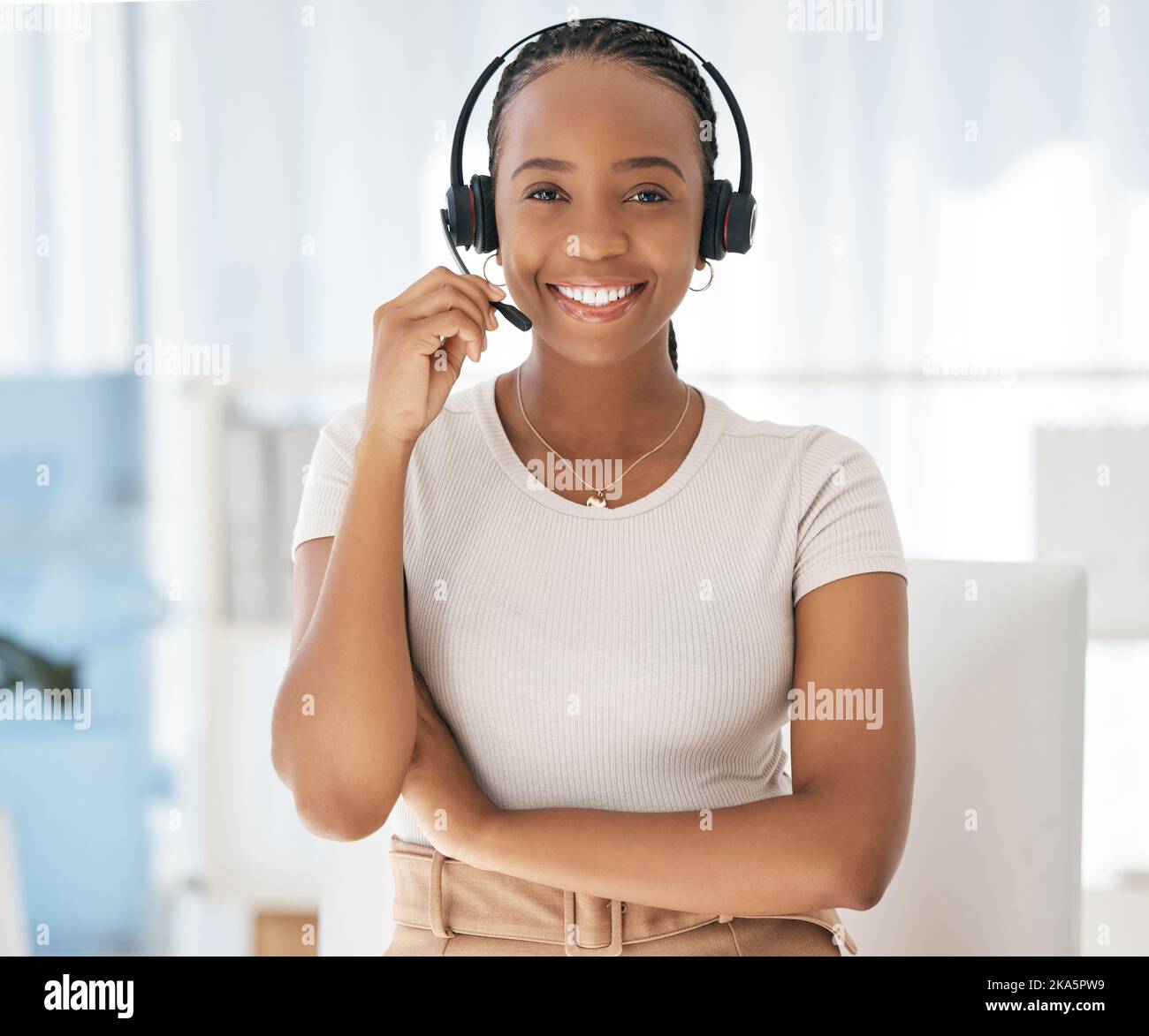 Contact us customer support, black woman and web help worker on an office phone consultation. Portrait of happy internet call center online consultant Stock Photo