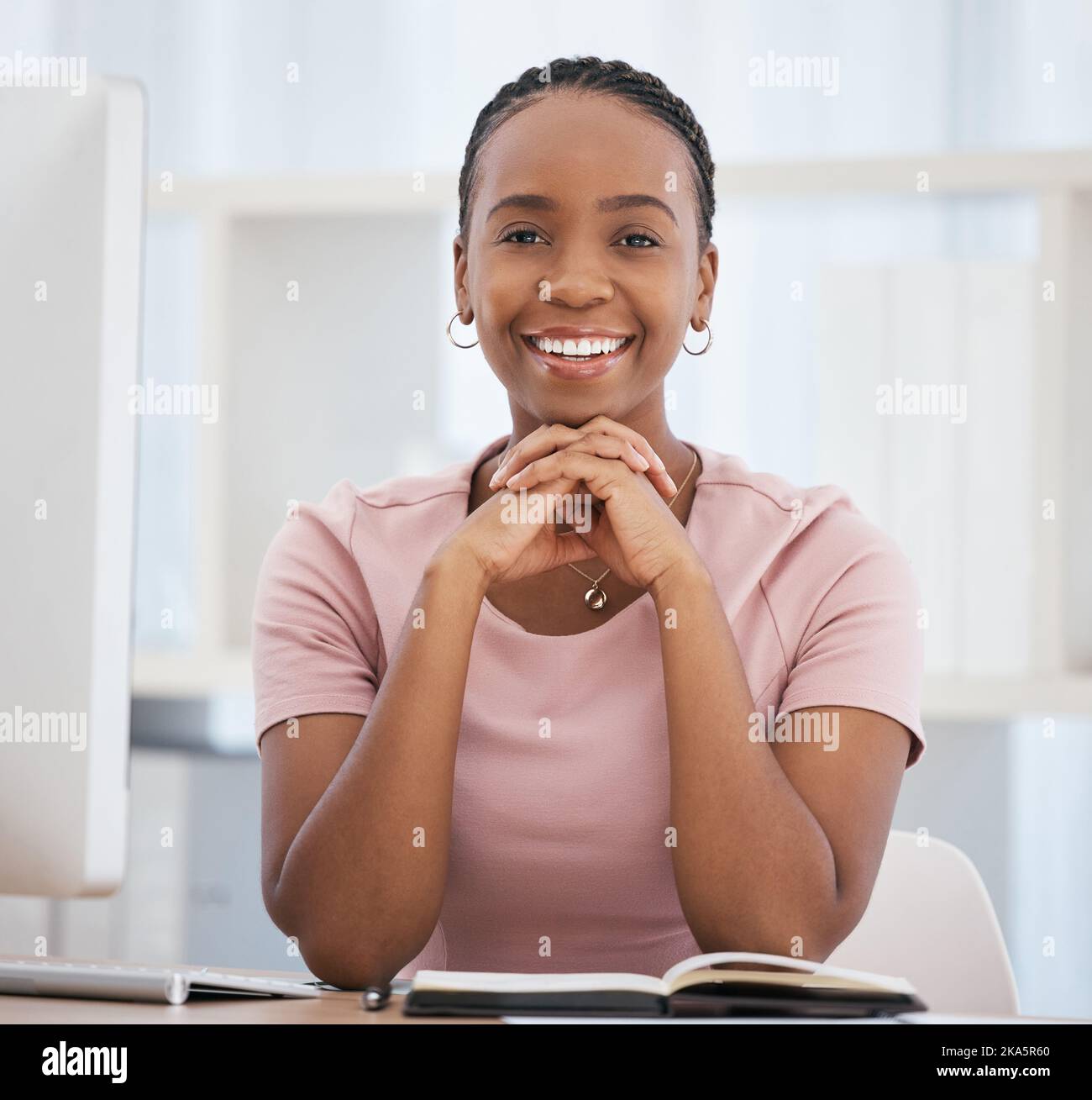 Portrait, black woman and business with notebook, smile and confident for startup company. African American lady, female entrepreneur and manager Stock Photo