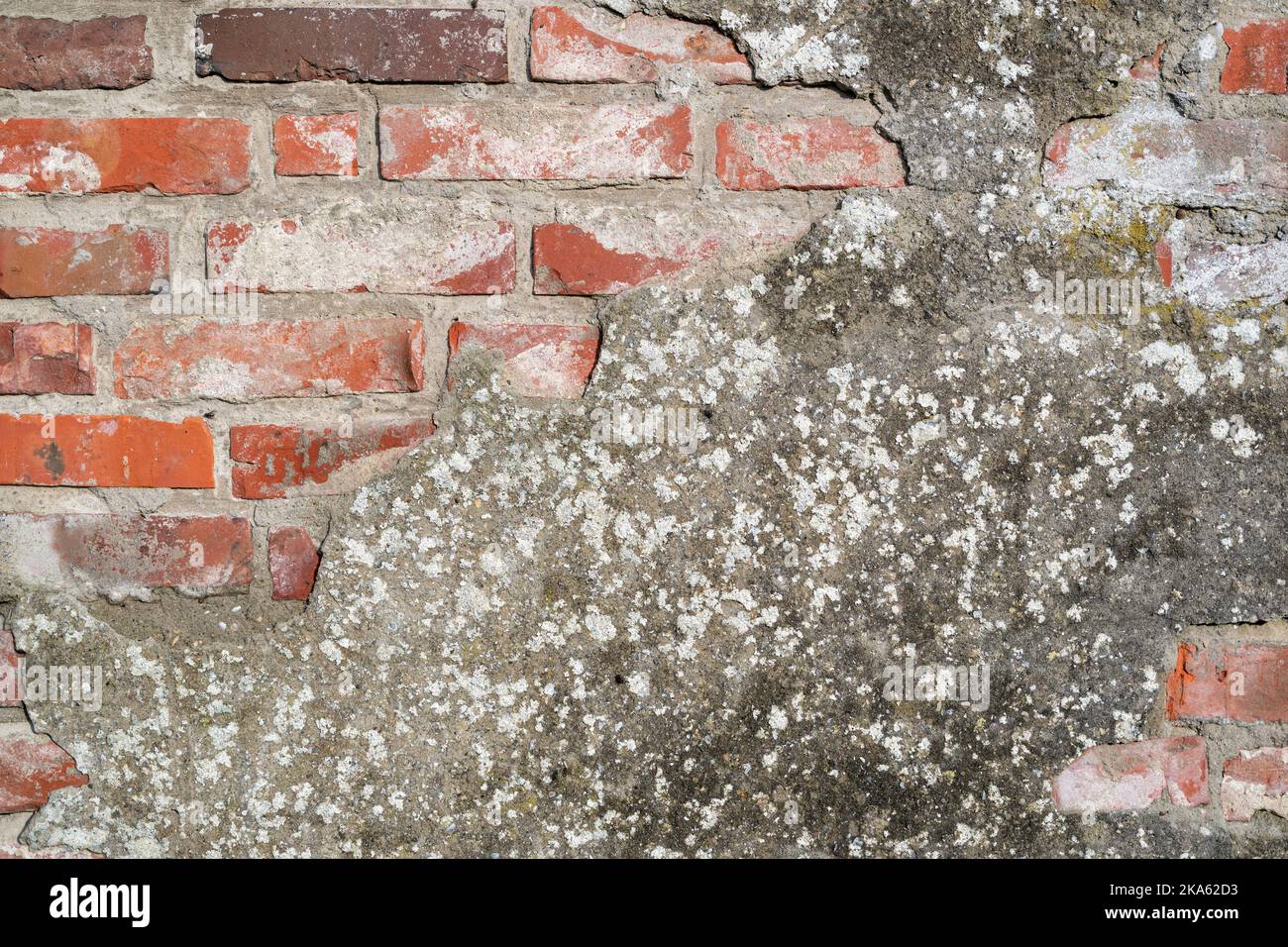 brick wall with crumbling plaster for background use Stock Photo Alamy