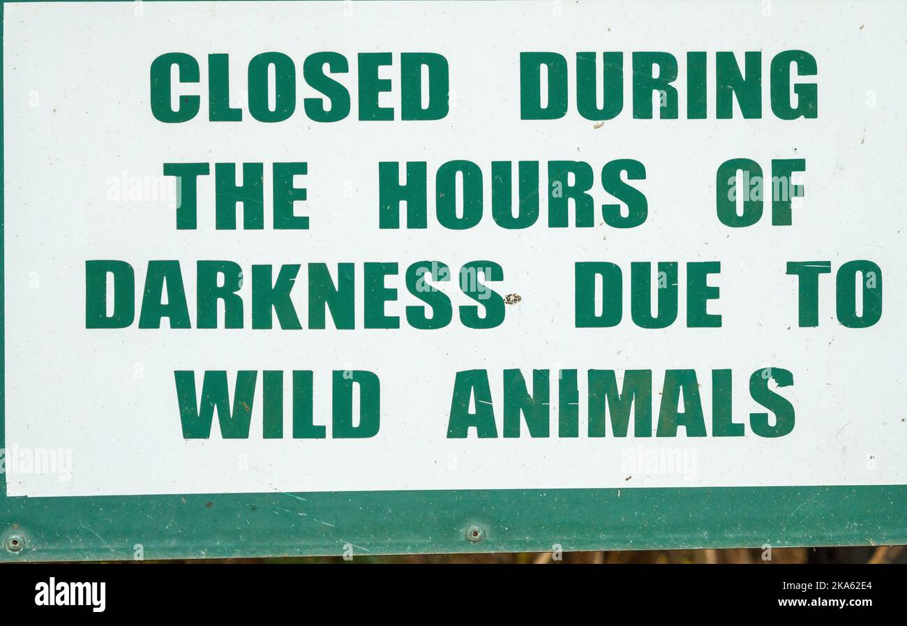 sign or signage with text or words closed during the hours of darkness