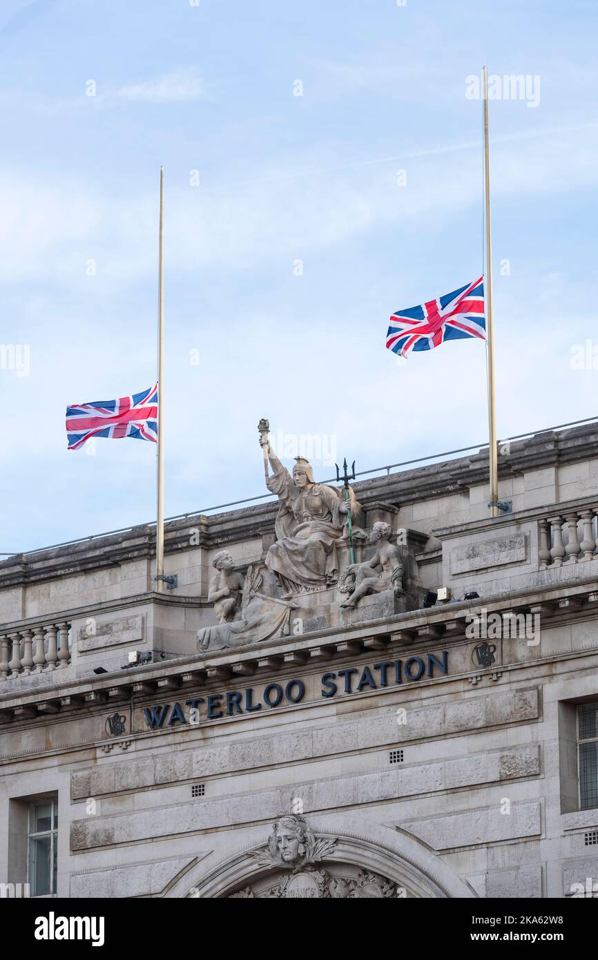 Union Jack flags flying at half mast, over Waterloo Station, to mark
