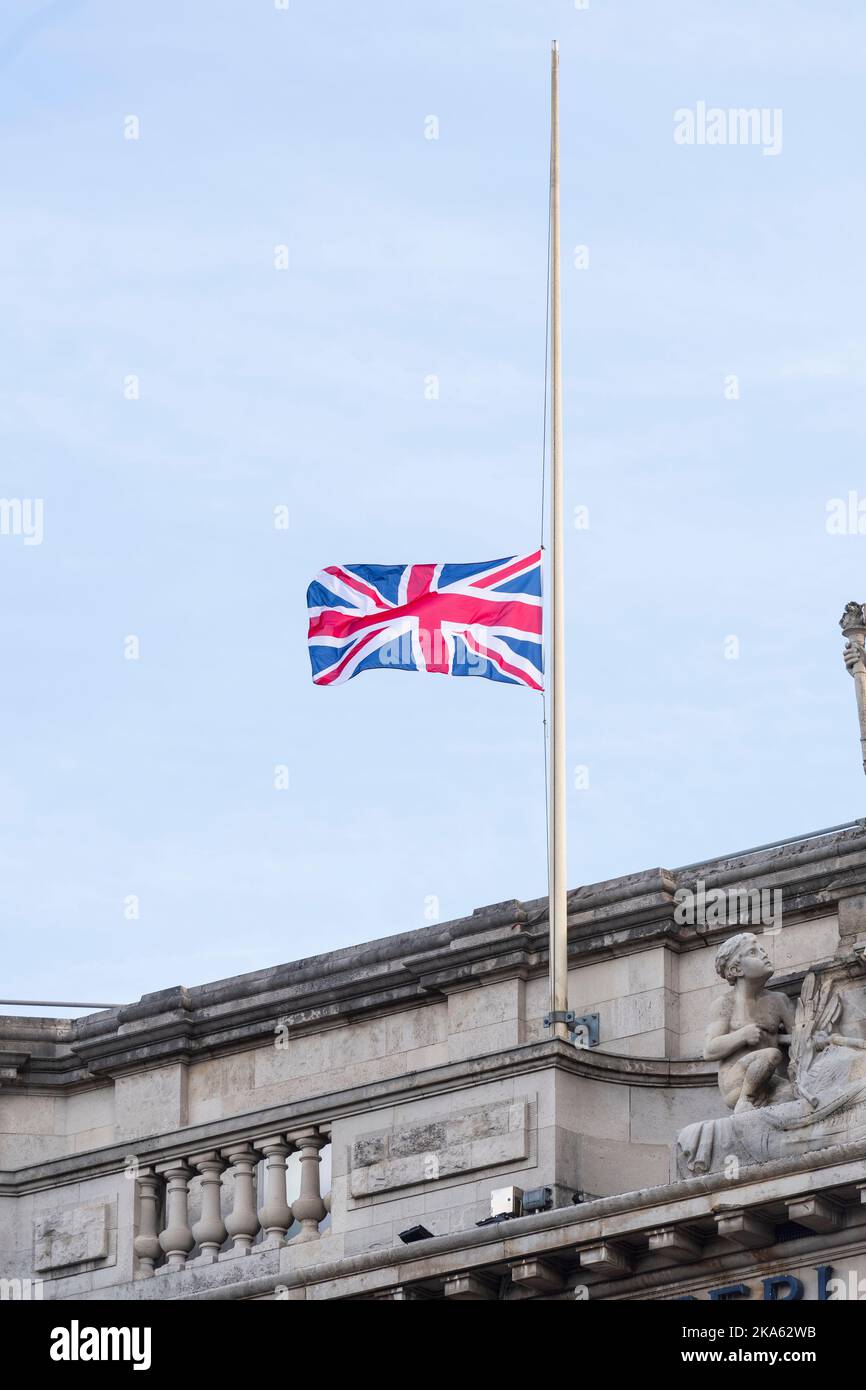 Union Jack flags flying at half mast, over Waterloo Station, to mark