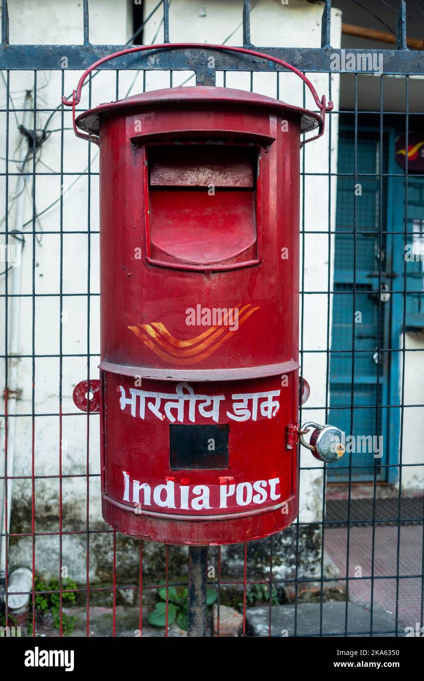 October 14th 2022 Dehradun City Uttarakhand India. India Post services. Vintage Red letter box. Stock Photo