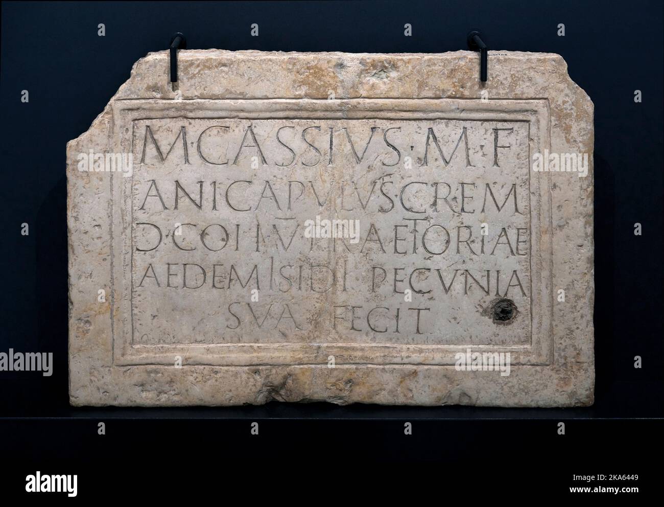 Iscrizione dedicatoria di un sacello a Iside  - marmo bronzetto di Verona  - inizio I sec. d.C. - Mantova, Museo Archeologico Stock Photo