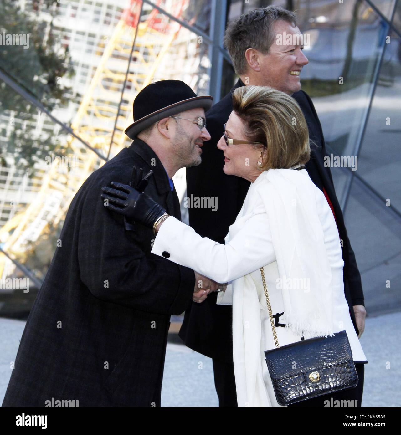 Norwgian Queen Sonja and Craig Dykers, Snoehetta Achitects, pictured near the plaque with inscribed names of the 9/11 victims at Ground Zero in New York Friday October 21, 2011. Photo Lise Aserud / Scanpix Norway / POOL Stock Photo