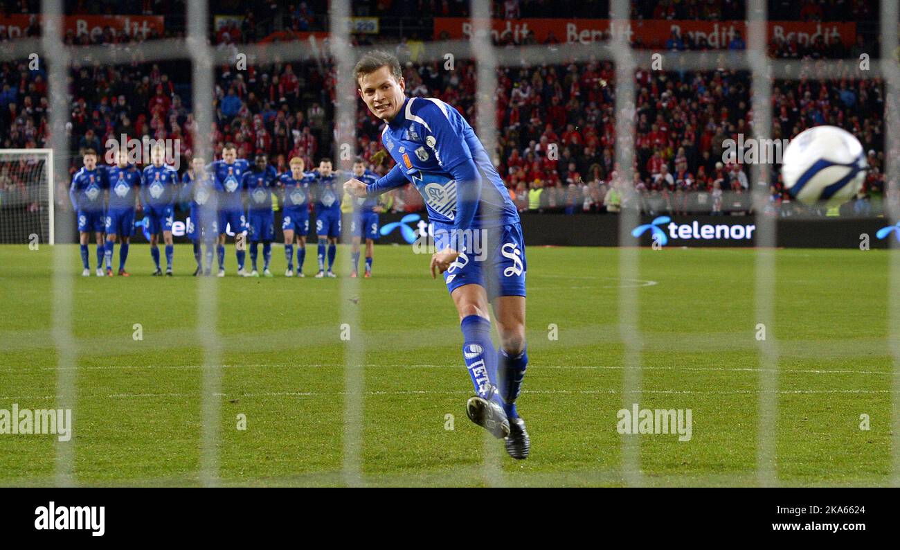 Il Hod'S Andreas Rekdal scores the first penalty of thier 5-3 victory ...