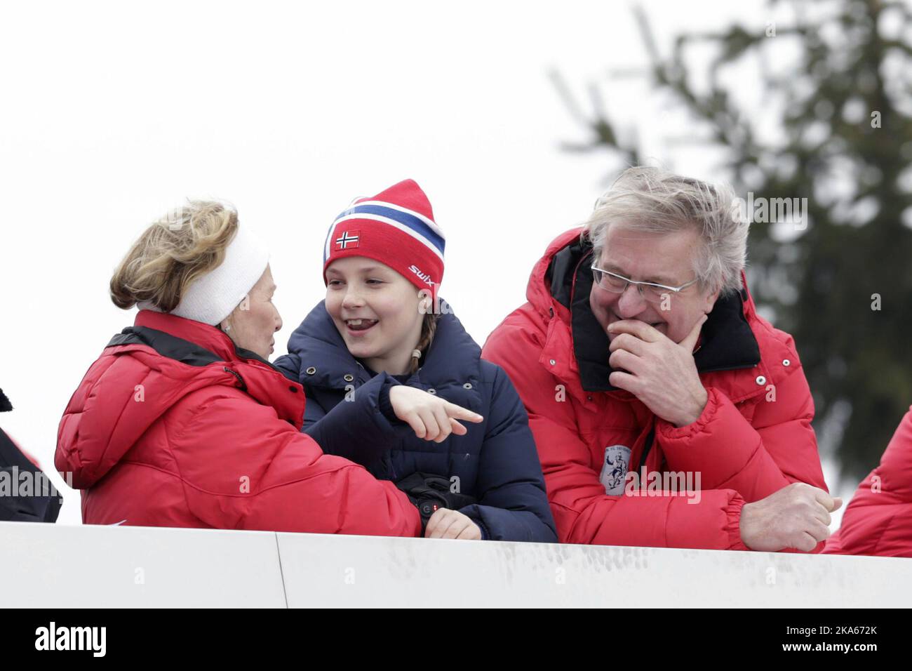 The Norwegian Royal Family visits Holmenkollen at Ski World Cup, watching ski jump. From left: Queen Sonja, Princess Ingrid Alexandra  and Fabian Stang, mayor of Oslo.   Stock Photo