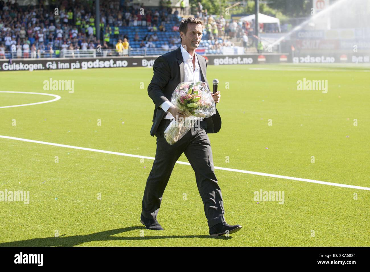 Outgoing manager of Stromsgodset FK and incoming manager of Scottish Premiership club Celtic Ronny Deila reacts after speaking to the supporters after half time of the match between Stomsgodset and Haugesund in the Norwegian top football league in Drammen, 9 June 2014. Photo by Audun Braastad, NTB scanpix Stock Photo