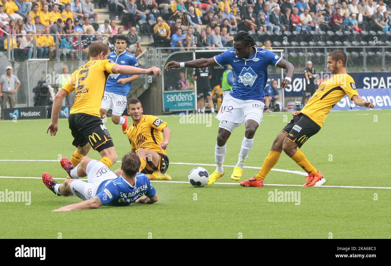 Moldes Daniel Chima Chukwu in attack with Start Amin Nouri to h. During the Premier League battle between Start and Molde on Sparebanken Sør Arena.  Stock Photo