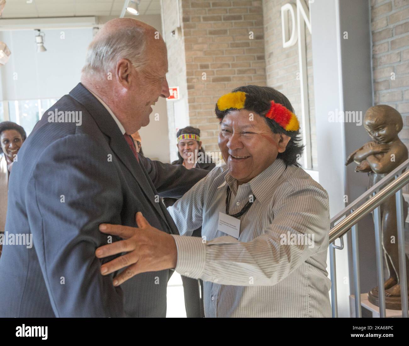 Oslo 20140918. Norwegian King Harald met with the elder of the yanomami-indians in the Amazon basin, DavÃ Kopenawa, recently during a conference in Oslo under the auspices of the Rainforest Foundation of Norway. They know each other well, King Harald stayed with Mr. Kopenawa and his tribe in the jungle for a number of days in May of 2013. Photo: Terje Bendiksby / NTB scanpix  Stock Photo