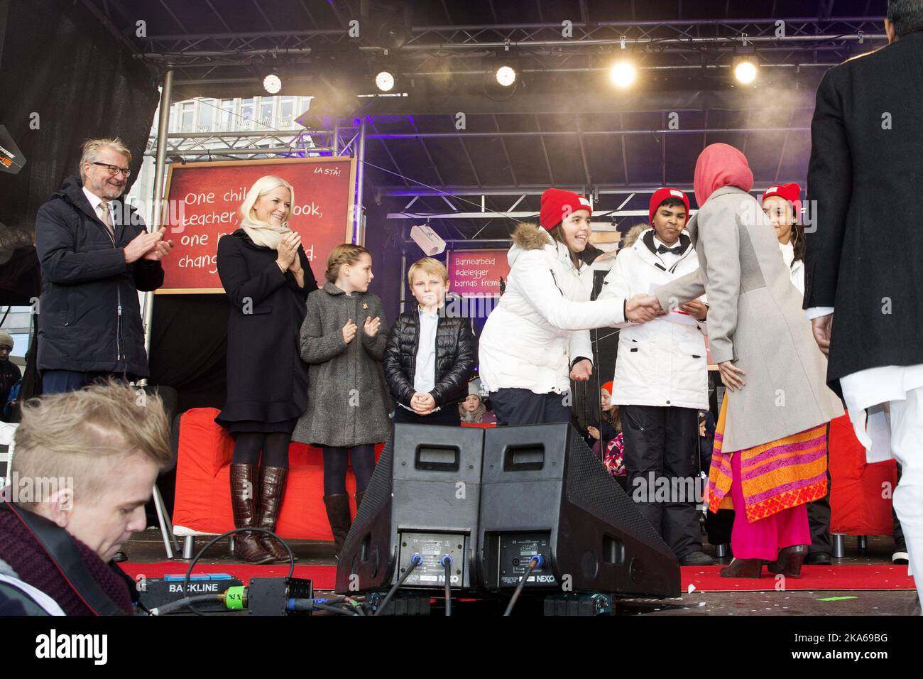 Oslo 20141210. The Nobel Peace Prize 2014. Nobel Peace Prize laureates Malala Yousafzai and Kailash Satyarthi is greeted by hosts, and from left: Mayor Fabian Stang, Crown Princess Mette-Marit, Princess Ingrid Alexandra and Prince Sverre Magnus under Save the Children Prize party outside the Nobel Peace Center in Oslo on Wednesday morning. Photo: Hakon Mosvold Larsen/ Stock Photo