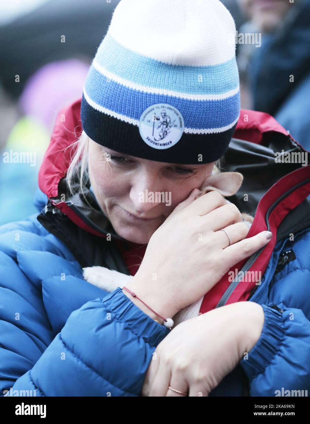 Oslo 20150113. The Royal Crown Prince Couple visit Toyenparken in Oslo on Tuesday for the opening of the Outdoor Recreation Year 2015 (Friluftlivets aar). 1600 children an youth attended the opening. Here puppy 'Toeffen' owned by mayor Fabian Stang receives the royal touch of the Crown Princess Mette-Marit. Photo: Lise Aaserud / NTB scanpix  Stock Photo