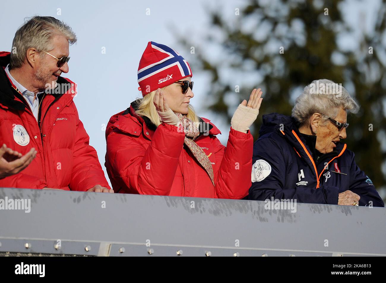 Oslo, Norway, 20150315 The Norwegian Royal Family were present in the Royal box at the Holmenkollen Ski Arena in Oslo Sunday March 15, 2015 for the last World Cup skijump competition of the season. Picture shows mayor of Oslo, Fabian Stang, Crownprincess Mette-Marit and Princess Astrid. Photo: Jon Olav Nesvold / NTB scanpix  Stock Photo