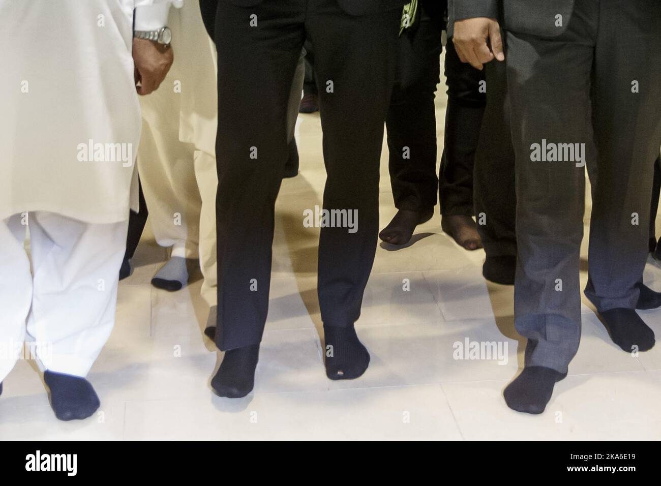 OSLO, Norway 20150918.Crown Prince Haakon with holes on the sock. Crown Prince Haakon visits Central Jamaat-e Ahl-e Sunnat mosques in Groenland in Oslo Friday. On that occasion opens the Crown Prince a conference for young religious and ethical leaders. It is 'Samarbeidsraadet for tros- og livssynssamfunn' who is organizing the conference. Conspiracy thinking, leadership training and the prevention of violent extremism are among the topics. Photo: Heiko Junge / NTB scanpix Stock Photo