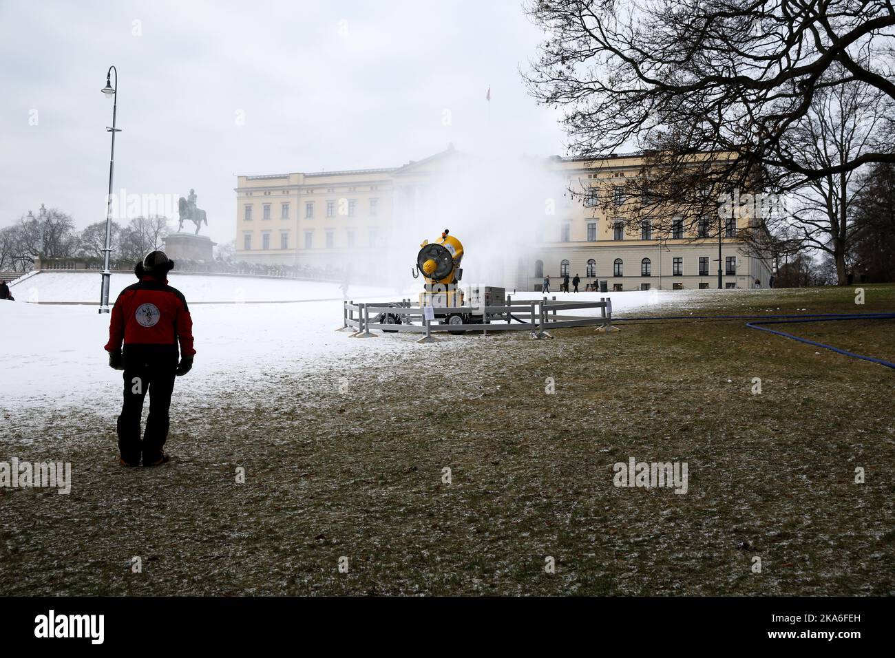OSLO, Norway 20160104. Today's picture of NTB scanpix. A snow canon produces snow on Slottsplassen (Palace Square) in Oslo. The snow is made to an event in conjunction with Kong Harald and Queen Sonja's 25th anniversary as king and queen of Norway. Photo: Cornelius Poppe / NTB scanpix Stock Photo