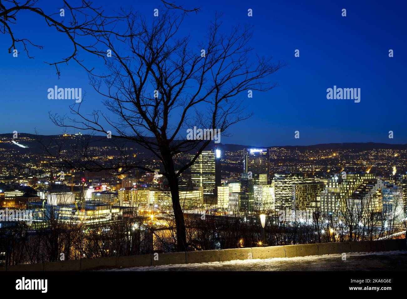 OSLO, Norway 20160215. Evening light over Oslo seen from Ekeberg restaurant. Barcode, Bjoervika, Soerenga, The Opera, Radisson Blu Plaza Hotelll, Postbygget. Photo: Heiko Junge / NTB scanpix Stock Photo