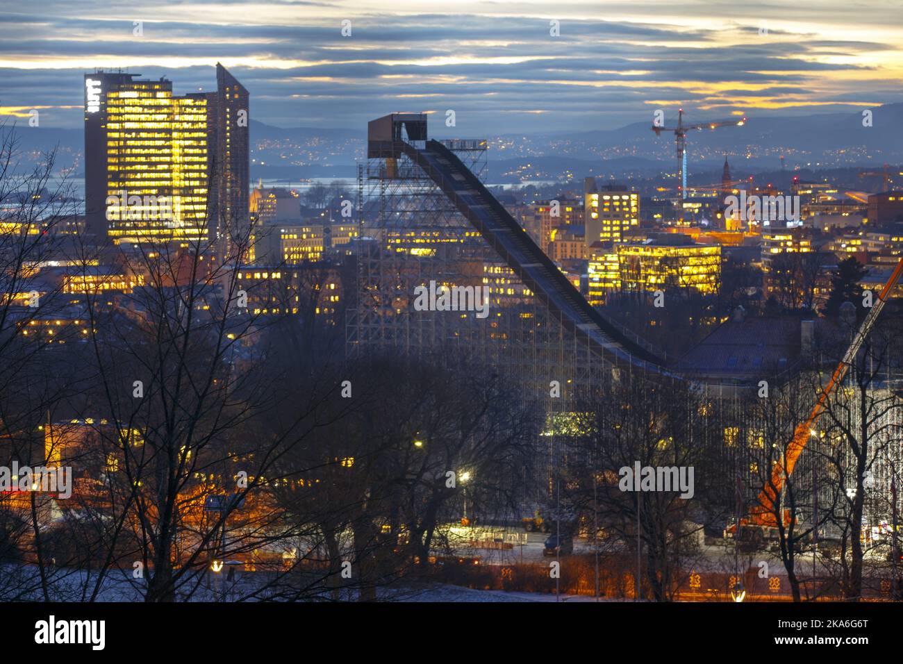 OSLO, Norway 20160216. X-games are going to be held in Oslo in late February. The ski jump is under construction. The scaffold towers 55 meters above the ground. Oslo City Hall to the left in the picture. Postbygget and Radisson Blu Plaza Hotell on the left in the picture. Photo: Heiko Junge / NTB scanpix Stock Photo