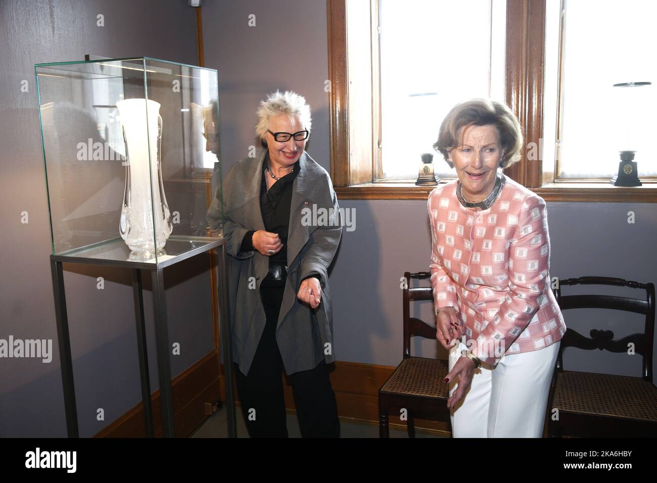 Oslo, Norway 20160512. Queen Sonja attended the opening of the exhibition'Smakebiter' (Samples) from Her Majesty's collection of glass art at Gallery Queen JosÃ©phine at Oscarshall. Glass artist Ulla-Mari Brantenberg (left). Photo: Vidar Ruud / NTB scanpix Stock Photo