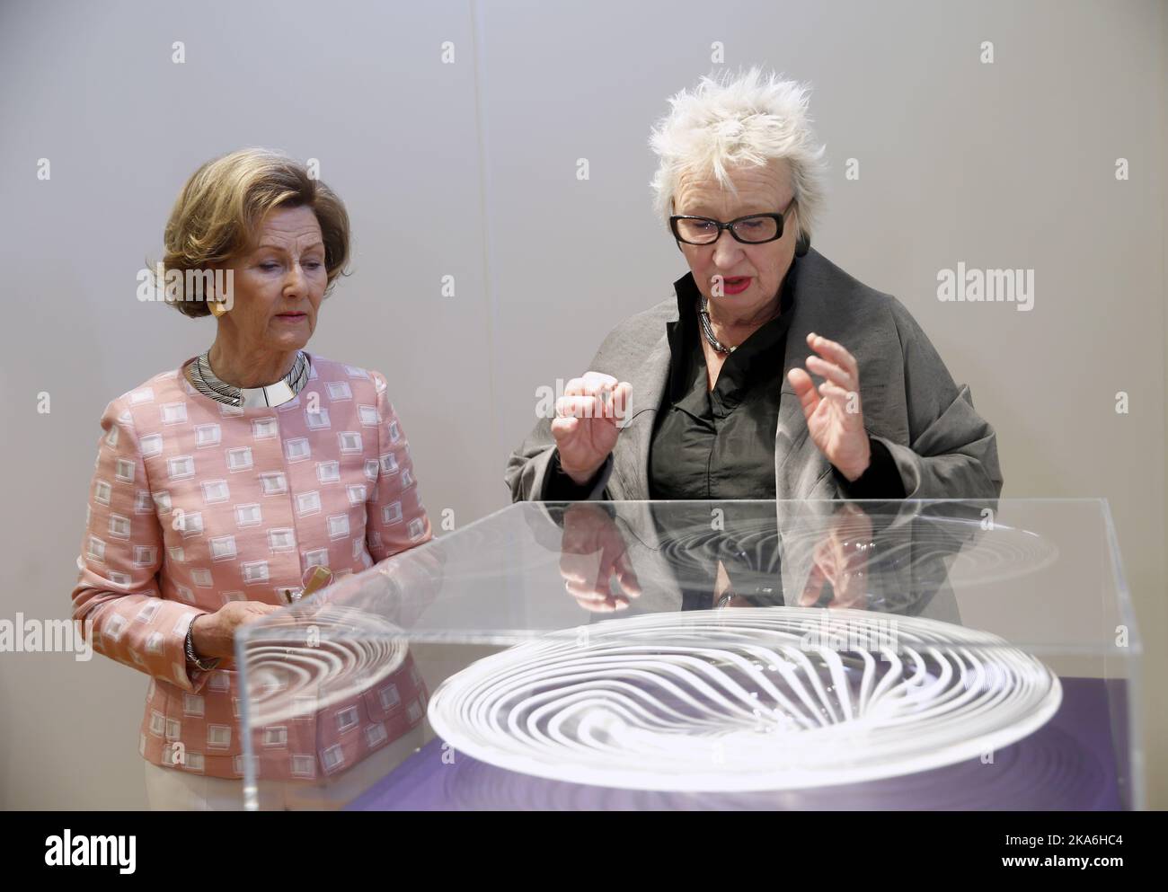Oslo, Norway 20160512. Queen Sonja attended the opening of the exhibition'Smakebiter' (Samples) from Her Majesty's collection of glass art at Gallery Queen JosÃ©phine at Oscarshall. Glass artist Ulla-Mari Brantenberg (right) Photo: Vidar Ruud / NTB scanpix Stock Photo