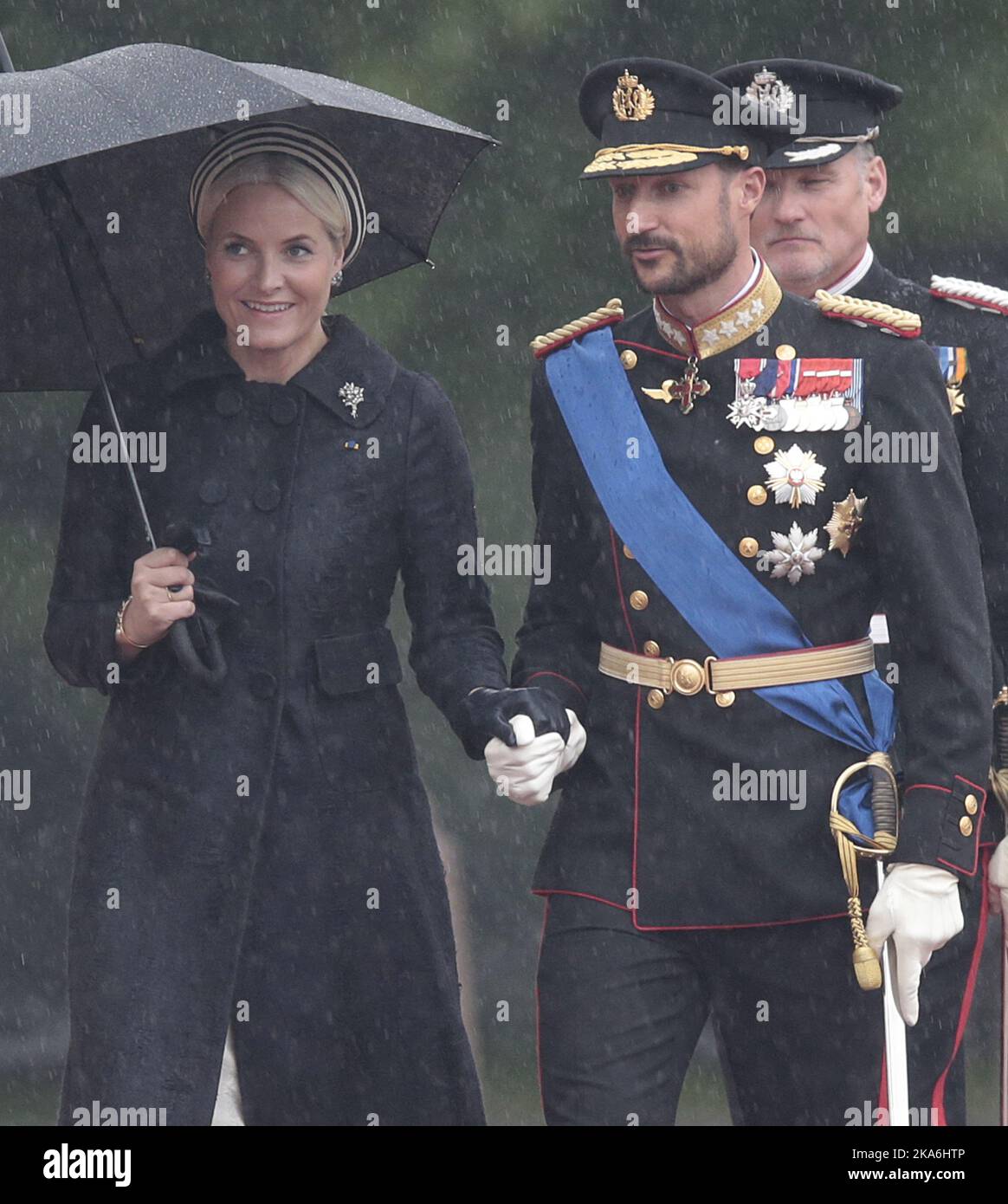 queen and smiling king with crowns holding hands isolated on grey Stock  Photo - Alamy