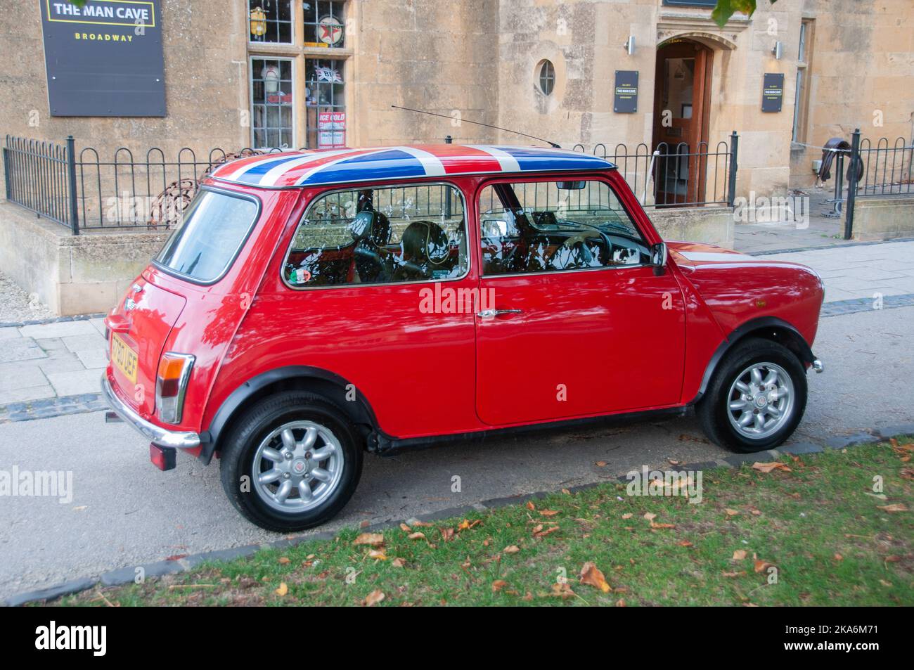 Around the UK - A British 'Mini' car, with the Union Flag on the roof Stock Photo