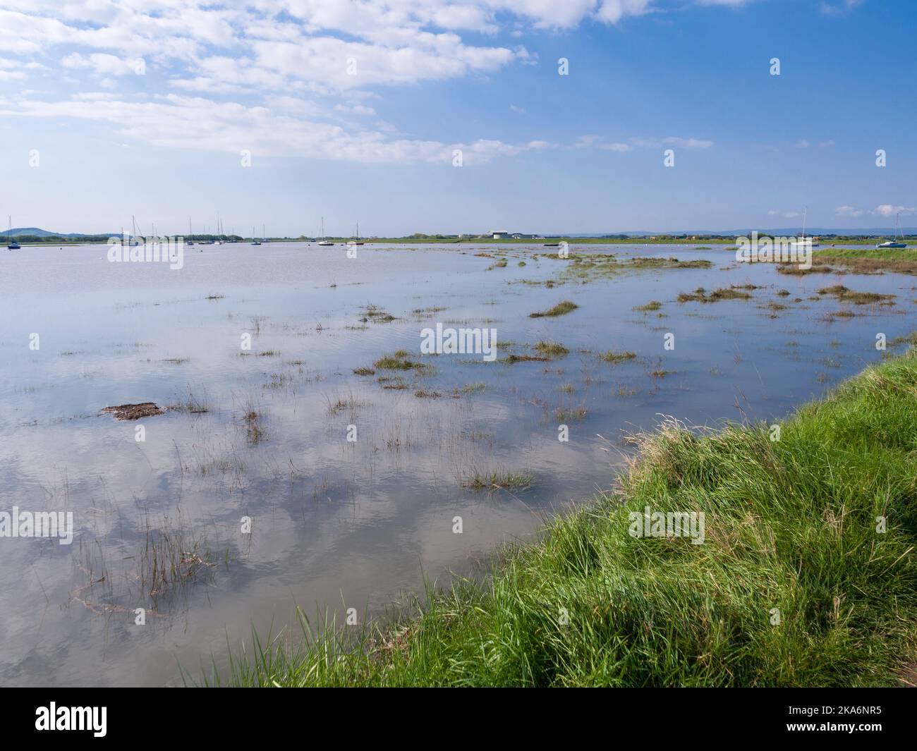 The River Axe estuary at high tide, Uphill, North Somerset, England. Stock Photo