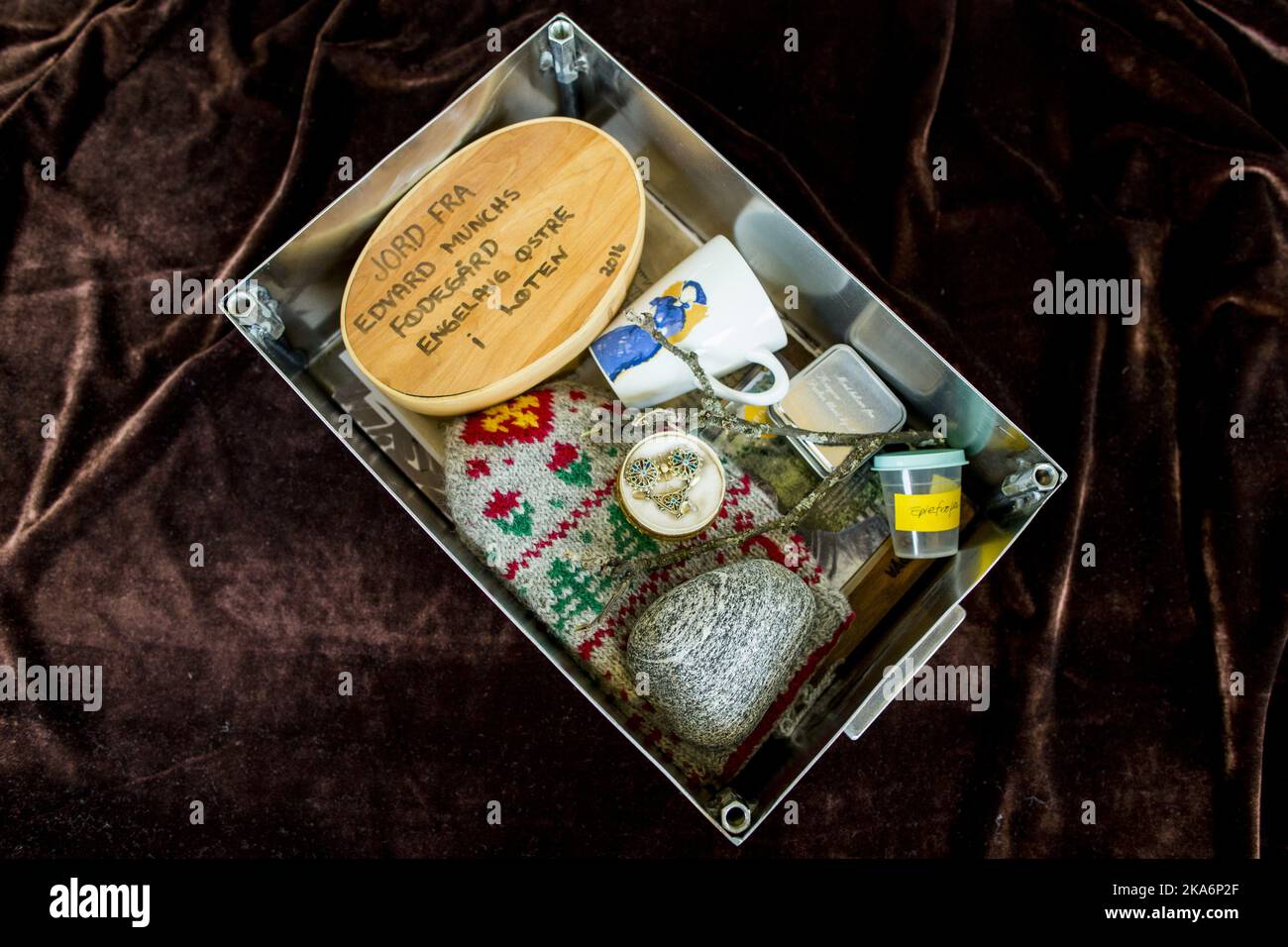 Oslo, Norway 20161013. Items from eight municipalities, which in various ways relates Edvard Munch to the objects, are collected in a box to be placed in the floor of the new Munch Museum 'Lambda' in Oslo. The foundation stone containesm mittens, a brooch, a stone, a cup. Photo: Vegard Wivestad Groett / NTB scanpix Stock Photo
