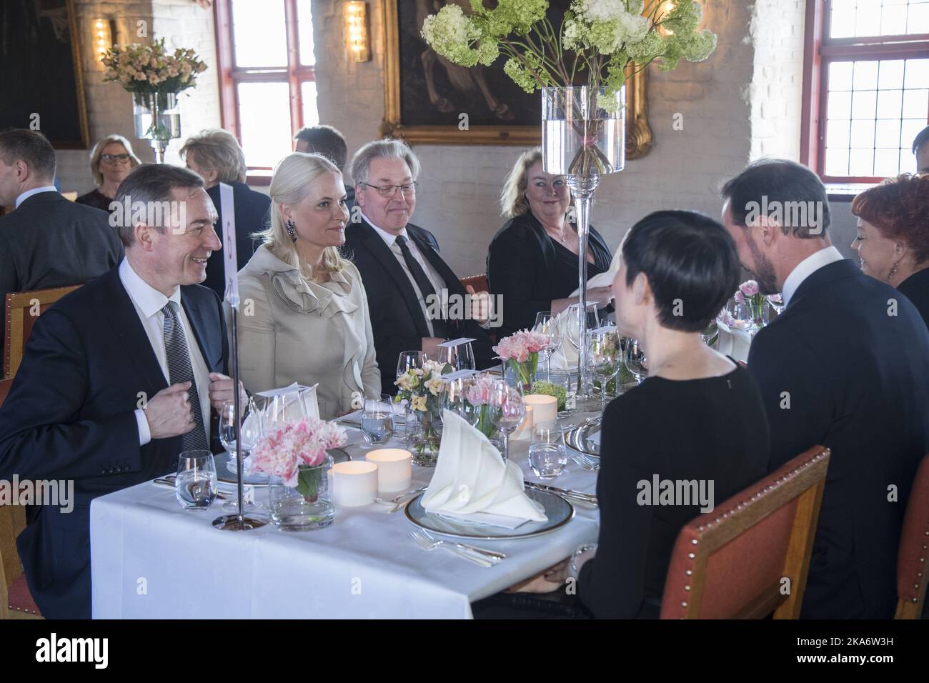 OSLO, Norway 20170322. EEA and EU Minister Frank Bakke-Jensen and Crown Princess Mette-Marit before lunch at Akershus Fortress in connection with the Icelandic presidential couple's official state visit to Norway. Photo: Heiko Junge / NTB scanpix Stock Photo