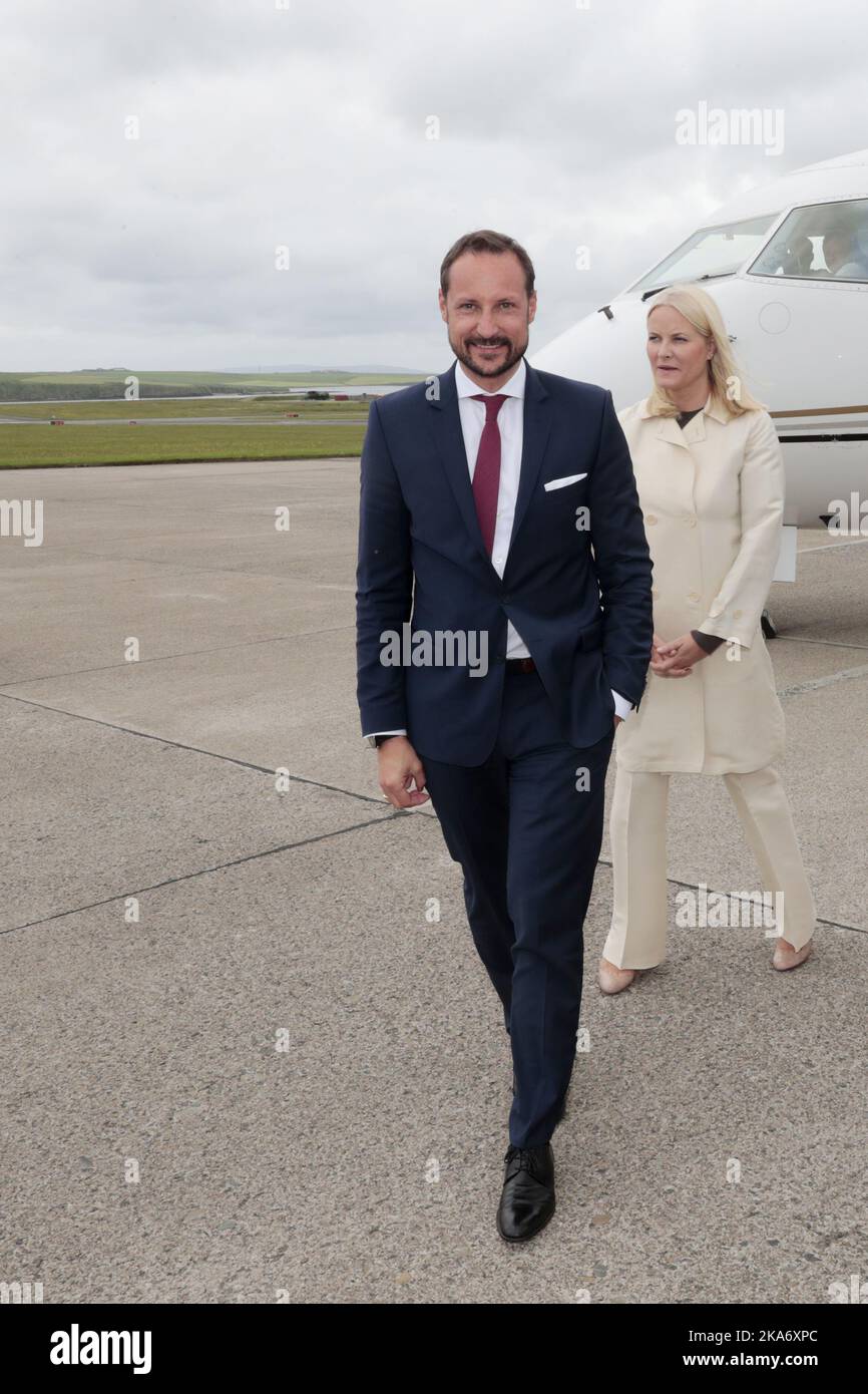KIRKWALL, Great Britain 20170616. Crown Princess Mette-Marit (pictured) and Crown Prince Haakon arrive at Kirkwall Airport on Orkney Islands on the occasion of the official visit in connection with the St. Magnus festival. Photo: Lise Aaserud / NTB scanpix Stock Photo
