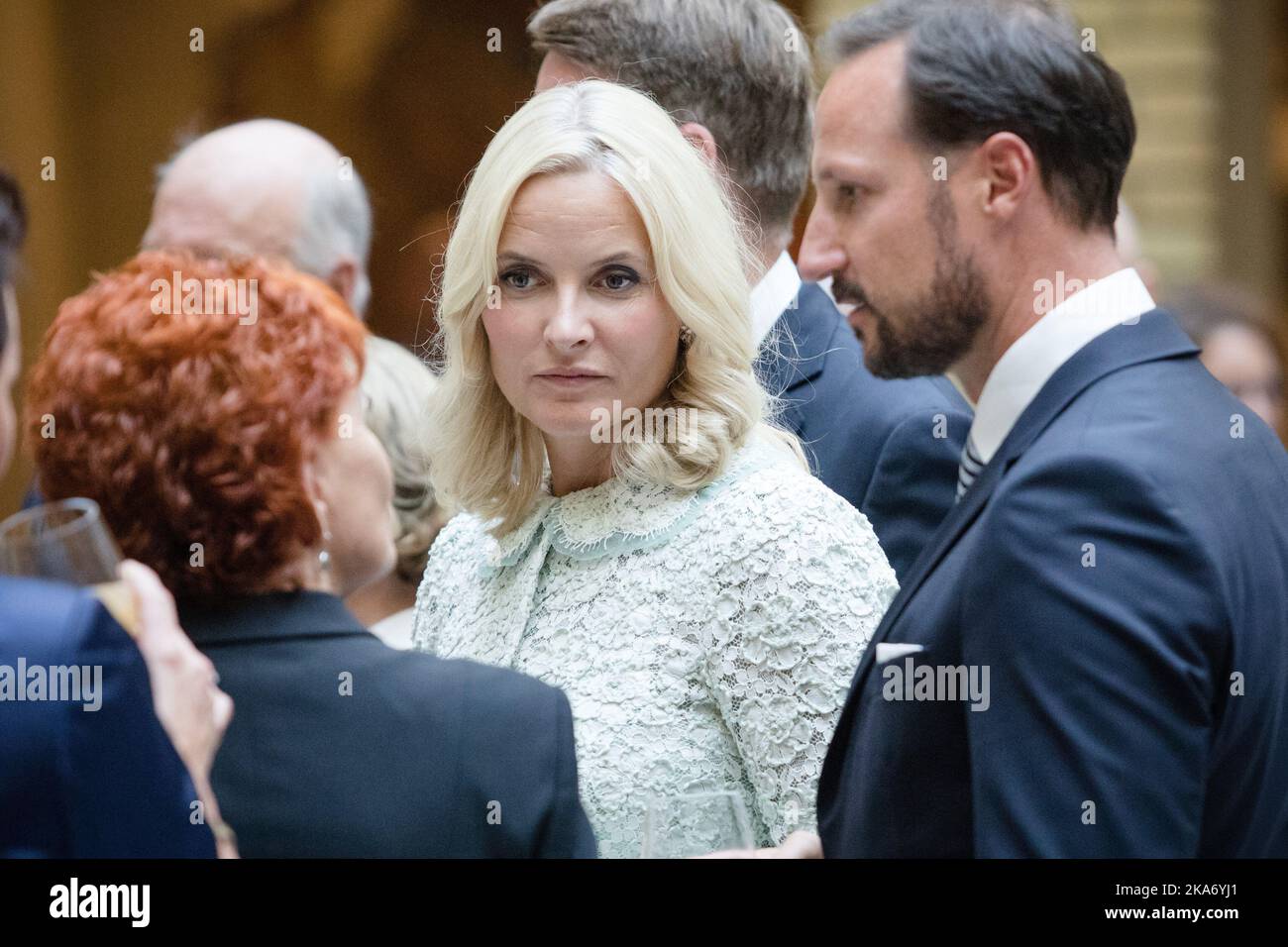 Oslo, Norway 20170918. Crown Princess Mette-Marit and Crown Prince Haakon during the unveiling of the King and Queen's 80th anniversary gift from the Storting (Parliament) on Monday. The gift is a painting by Kira Wager called 'King Olav V's Oath for the Storting'. Photo: Audun Braastad / NTB scanpi Stock Photo