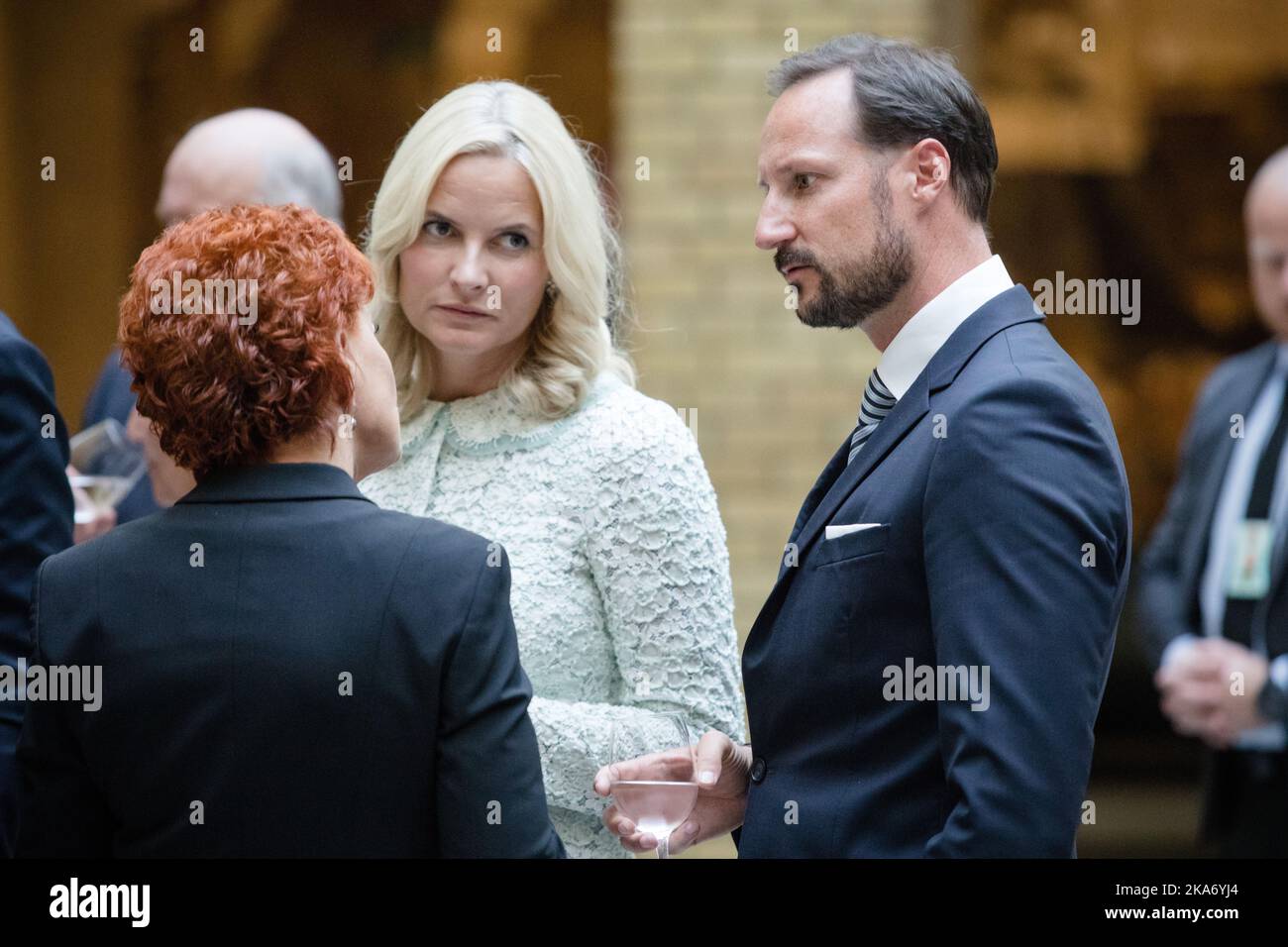 Oslo, Norway 20170918. Crown Princess Mette-Marit and Crown Prince Haakon during the unveiling of the King and Queen's 80th anniversary gift from the Storting (Parliament) on Monday. The gift is a painting by Kira Wager called 'King Olav V's Oath for the Storting'. Photo: Audun Braastad / NTB scanpix Stock Photo