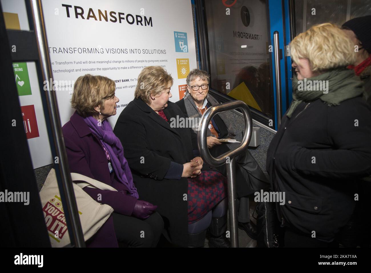 Davos, Switzerland 20180124. Prime Minister Erna Solberg is in a cable car with Bill Gates and the leader of the Bill & Melinda Gates Foundation, Susan Desmond-Hellmann in Davos Wednesday night. The three go up in the mountains to participate in a dinner where the theme is Global Goals. Solberg is present at the World Economic Forum to contribute to girls' right to education and the UN's sustainability goals. Photo: Heiko Junge / NTB scanpix Stock Photo