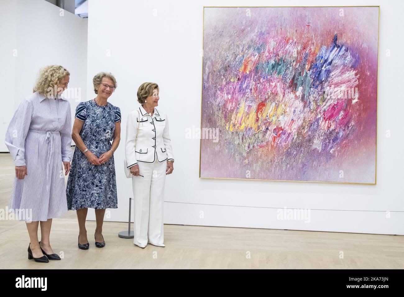 HOVIK, NORWAY 20180615. Queen Sonja is present during the opening of the Jakob Weidemann exhibition at Henie Onstad Art Center at Hovik. Here together with director Tone Hansen (left) and curator for the exhibition and former friend of Weidemann, Karin Hellandsjo, at the artwork 'Markblomst' from 1982. Photo: Haakon Mosvold Larsen / NTB scanpi Stock Photo