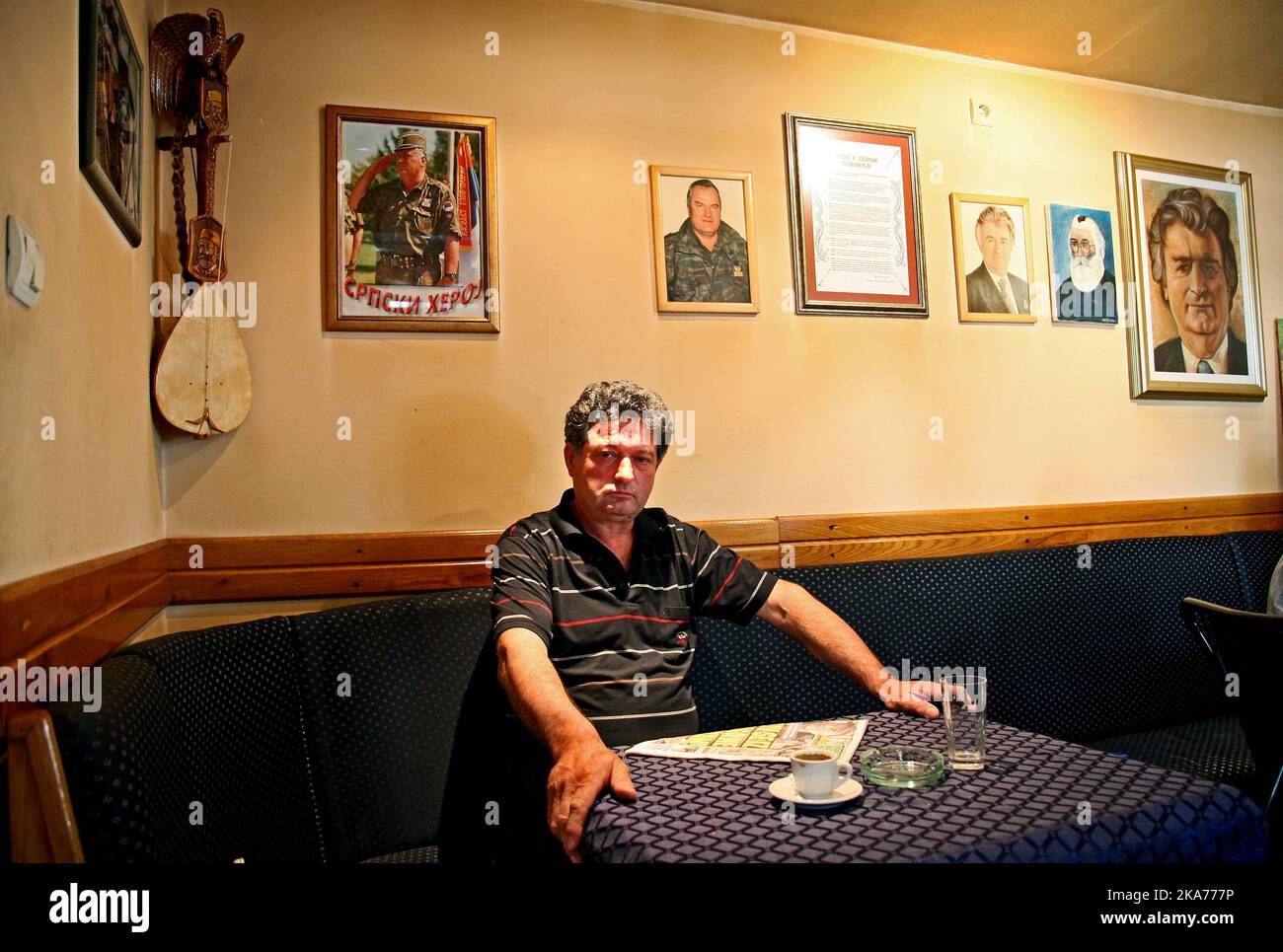 Belgrade, Serbia 20110529 Misko Kovijanic (57), believes the charge against Ratko Mladic is a plot. Serbian patriots and ultranationalists are invited to the Luda Kuca (Galle House) in Belgrade (Novi Belgrade). Here are pictures of both Mladic, Karadzic and Milosevic on the wall. This was also the hometown of Radovan Karadzic when he was fleeing disguised as miracle doctor Dragan Dabic. The owner characterizes it as a disaster that Ratko Mladic was arrested this week. The exgener is referred to as a freedom hero and benefactor. Photo: HANS CHR. HANSSON / VG Stock Photo
